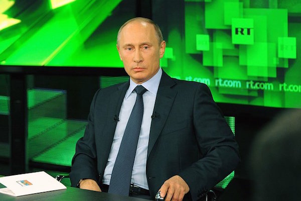 Russian President Vladimir Putin appears on state-owned television station Russia Today. (Photo by The Kremlin)