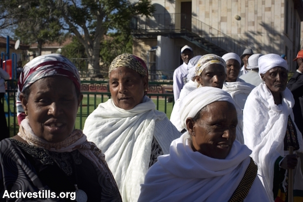 Ethiopian Jewish immigrants protest against a plan to evict them from an immigrant absorption center in Mevaseret Zion, near Jerusalem, May 1, 2014. (Oren Ziv/Activestills.org)