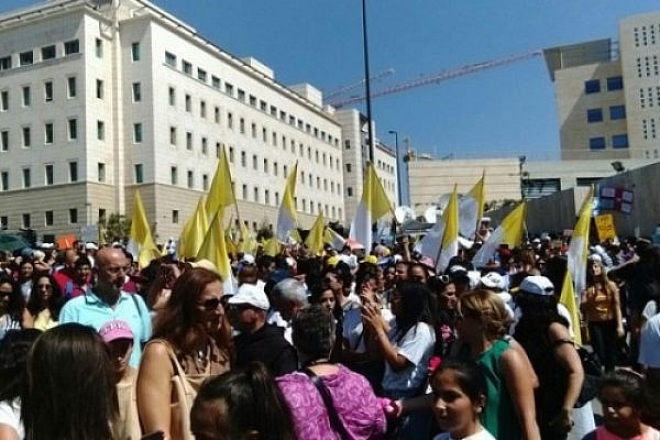 Thousands of people protest against budget cuts for church-run schools in front of the Prime Minister’s Office in Jerusalem.