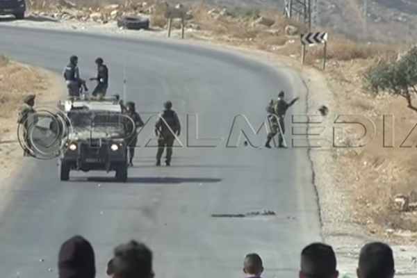 Israeli soldiers destroy cameras and equipment belonging to Palestinian and Italian journalists, Beit Furik, West Bank, September 25, 2015. (Screenshot: PALMEDIA)