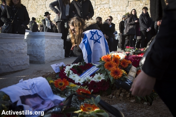 File photo of Jewish Israelis mourning at a funeral for murder victims. (Oren Ziv/Activestills.org)