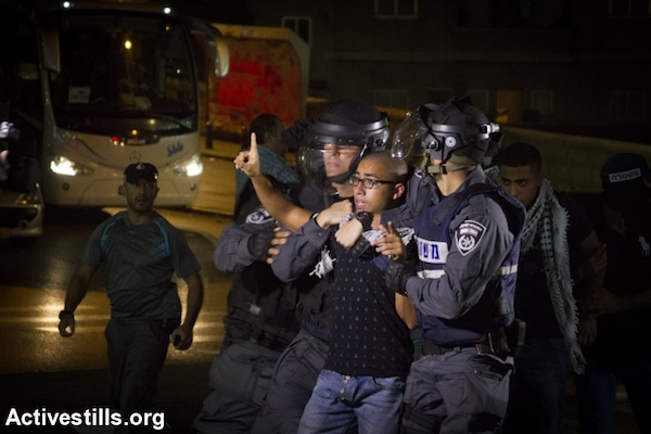 Israeli police arrest an Arab youth during a protest in Nazareth in northern Israel, October 8, 2015. (Omar Sameer/Activestills.org)