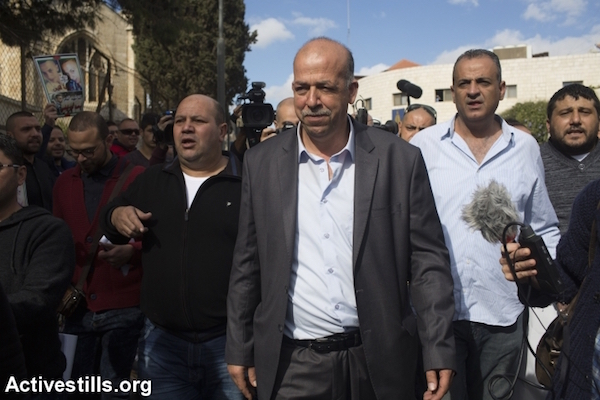 Hussein, the father of Palestinian teenager Mohammed Abu Khdeir, who was murdered last year, walks outside the district court in Jerusalem on November 30, 2015. (Oren Ziv/Activestills)