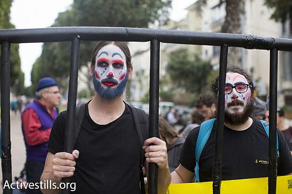 Israeli activists demonstrate on Purim in support of Israeli conscientious objectors, March 24, 2016. (photo: Oren Ziv/Activestills.org)