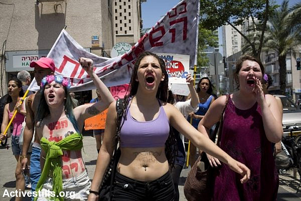 Women protesters shout slogans during a SlutWalk against sexism in Tel Aviv, May 9, 2014. (photo: Oren Ziv/Activestills.org)