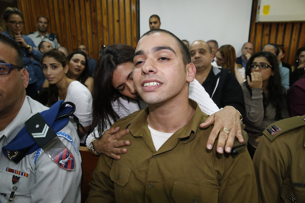 Israeli soldier Elor Azaria, who has been charged with manslaughter for shooting an incapacitated Palestinian stabbing suspect in Hebron, is seen in a military court, March 29, 2016. (Pool photo/AFP)
