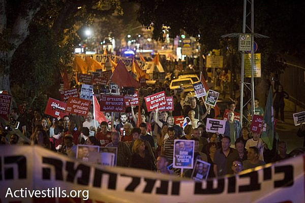 Some 2,000 Arab and Jewish Israelis march through Tel Aviv against the country’s right-wing politics, May 28, 2016. (Oren Ziv/Activestils.org)