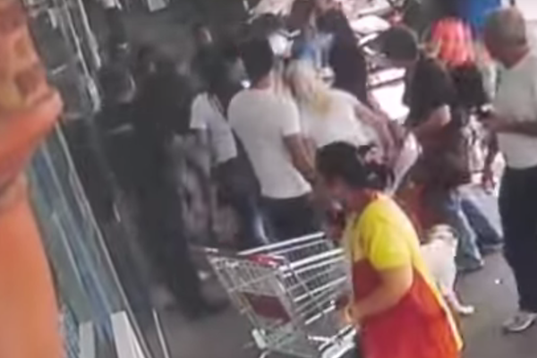 Screen shot of Border Police allegedly beating Arab worker outside central Tel Aviv supermarket.