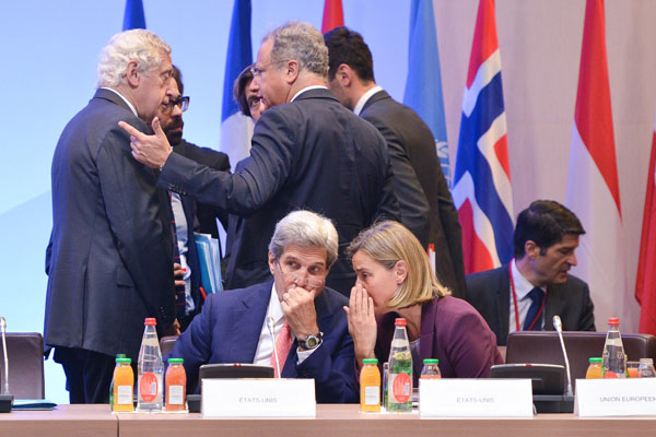 U.S. Secretary of State John Kerry speaks with EU foreign policy chief Federica Mogherini at the Paris Middle East peace summit, Paris, June 6, 2016. (EU Photo)