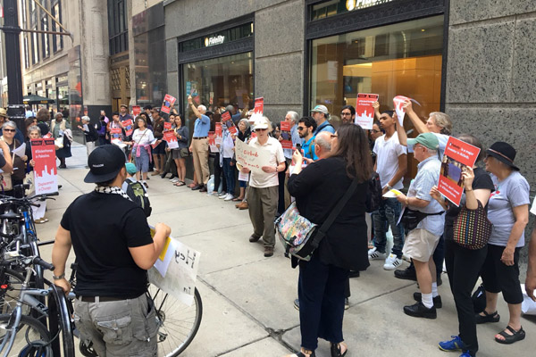 Protesters outside Fidelity Investment in Chicago demand that the company divest from Airbnb, June 3, 2016. (Courtesy of JVP)