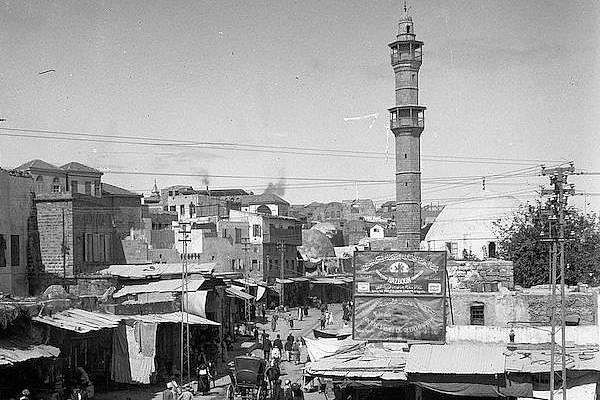 The market place in Jaffa, circa 1900. The photo has been taken from the Clock Tower Square, with Mahmoudiya Mosque in the background. (Library of Congress)
