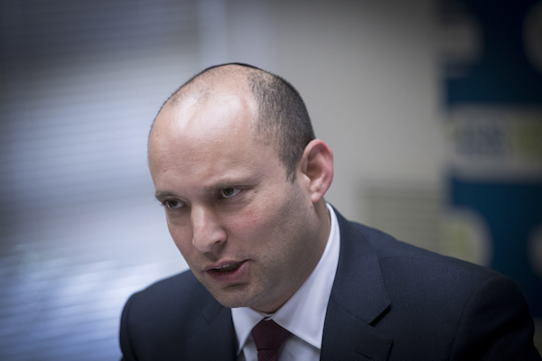 Jewish Home head Naftali Bennett leads a party faction meeting at the Knesset, December 12, 2016.  Bennett rejects the Palestinian of a Palestinian state under any framework, yet the U.S. has not boycotted him. (Yonatan Sindel/Flash90)