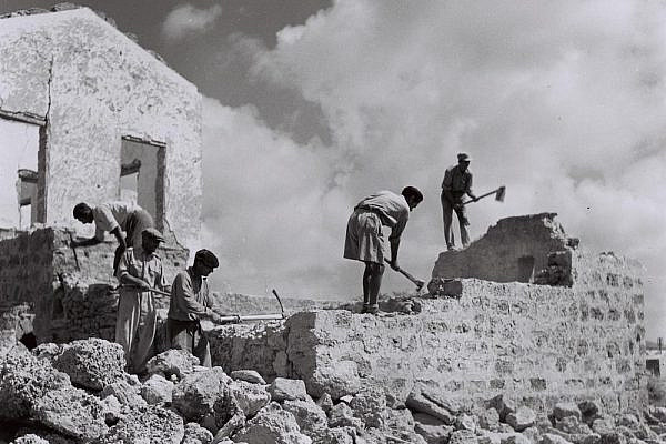 Jewish workers demolish homes in Jaffa following the 1948 battle that cleared the city almost all its Palestinian residents, October 6, 1949. (Fritz Cohen/GPO)