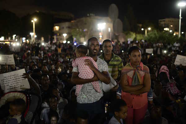 African asylum seekers protest on Saturday against the "Deposit Law", following which Eritreans and Sudanese are required to deposit fifth percent of their salary. (Tomer Neuberg/Flash90)