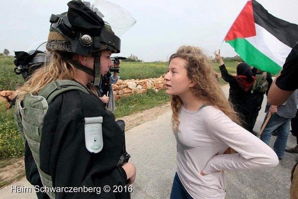 Who is David and who is Goliath? Ahed Tamimi faces down a soldier in Nabi Saleh. (Haim Shwarczenberg)