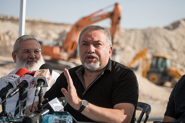 Israeli minister of Defense Avigdor Liberman holds a press conference during the construction of the new Israeli settlement Amichai, to be established as the new home for the evacuated residents of Amona, October 18, 2017.  (Hadas Parush/Flash90)