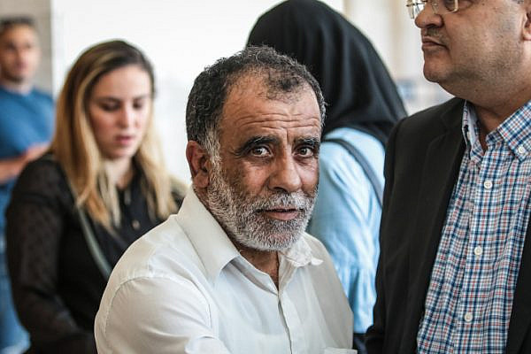 Hussein Dawabshe seen outside a court hearing in Lod, during a hearing on the attack on the West Bank village of Duma, where three members of the Dawabshe family were murdered, June 19, 2018. (Roy Alima/Flash90)