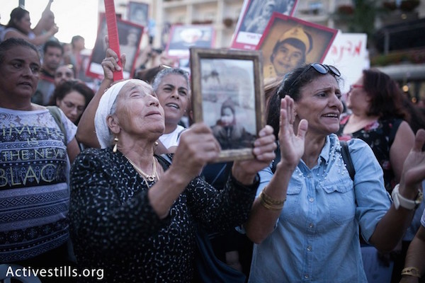 Protesters demand recognition and reparations for the state's abduction of Yemenite, Mizrahi, and Balkan children between the late 1940s and the 1960s. June 21, 2018. (Shiraz Grinbaum/Activestills.org)