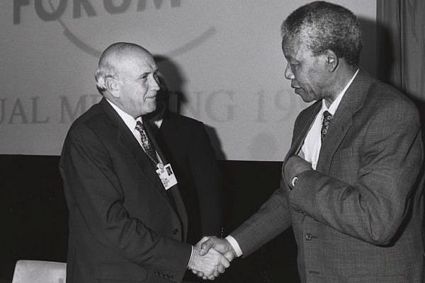 Frederik de Klerk and Nelson Mandela shake hands at the Annual Meeting of the World Economic Forum held in Davos in January 1992. (World Economic Forum/CC BY-SA 2.0)