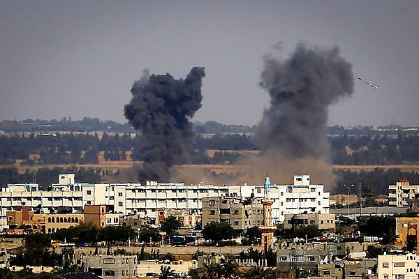 Smoke rises following an Israeli air strike in Rafah in the southern Gaza Strip on May 4, 2019. (Abed Rahim Khatib/Flash90)