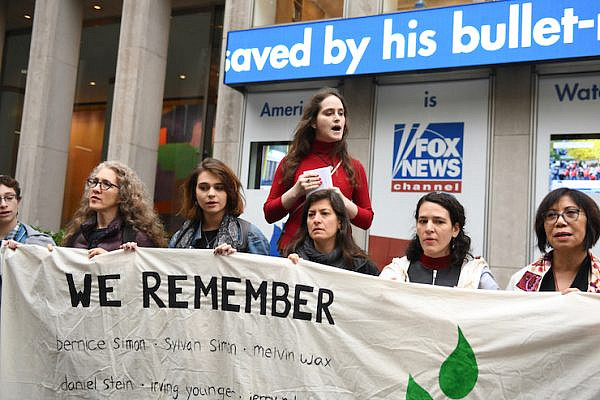 Author and activist Abby Stein speaks at a protest outside Fox News HQ held to commemorate the first anniversary of the Pittsburgh synagogue shooting, New York, October 25, 2019. (Gili Getz)