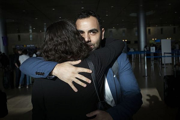 Human Rights Watch Israel and Palestine Director Omar Shakir parts with friends and supporters at Ben-Gurion Airport ahead of his deportation from Israel, November 25, 2019 (Oren Ziv/Activestills.org).