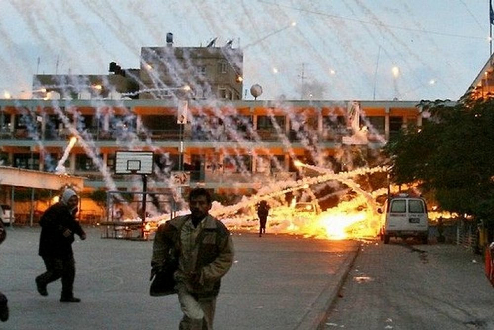 An Israeli attack on a U.N. school in Beit Lahiya using white phosphorus, Gaza, January 17, 2009. (Muhammad al-Baba)