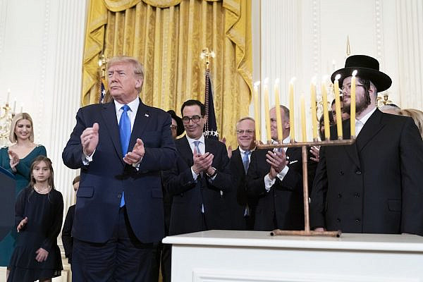 President Trump seen during the lighting of the Menorah during an evening Hanukkah Reception in the East Room of the White House, December 11, 2019. (Joyce N. Boghosian/White House)
