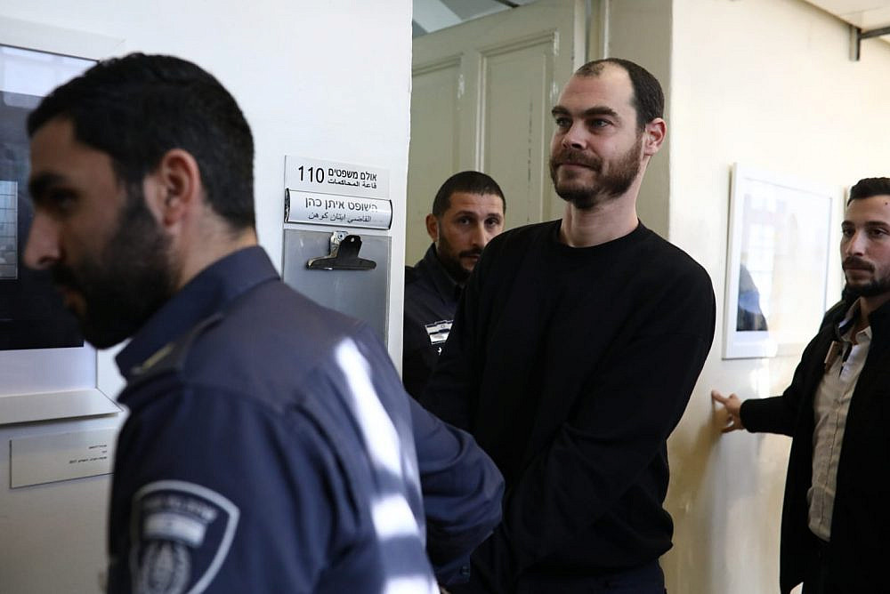 Israeli activist Jonathan Pollak at the Tel Aviv Magistrates' Court, arrested as part of an unprecedented private suit by Israeli right-wing group Ad Kan, Jan. 15, 2020. (Oren Ziv)