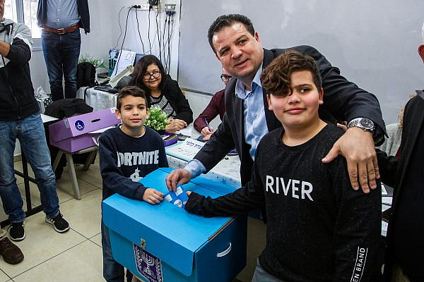 Joint List chairperson Ayman Odeh casts his ballot at a voting station in Haifa, during the Knesset Elections, on March 2, 2020. (Flash90)
