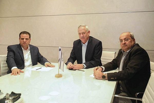 Blue and White Chairman Benny Gantz (center) meets with Joint List Chairman Ayman Odeh (left) and Joint List MK Ahmad Tibi to discuss the possibility of establishing a minority government backed by Israel's Palestinian-led parties, October 19, 2019. (Ofek Avshalom)