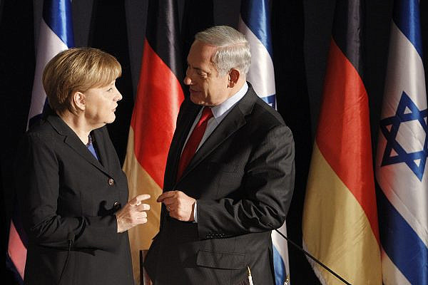 Israeli Prime Minister Benjamin Netanyahu holds a joint press conference with German Chancellor Angela Merkel at the King David hotel in Jerusalem on February 25, 2014. (Miriam Alster/FLASH90)