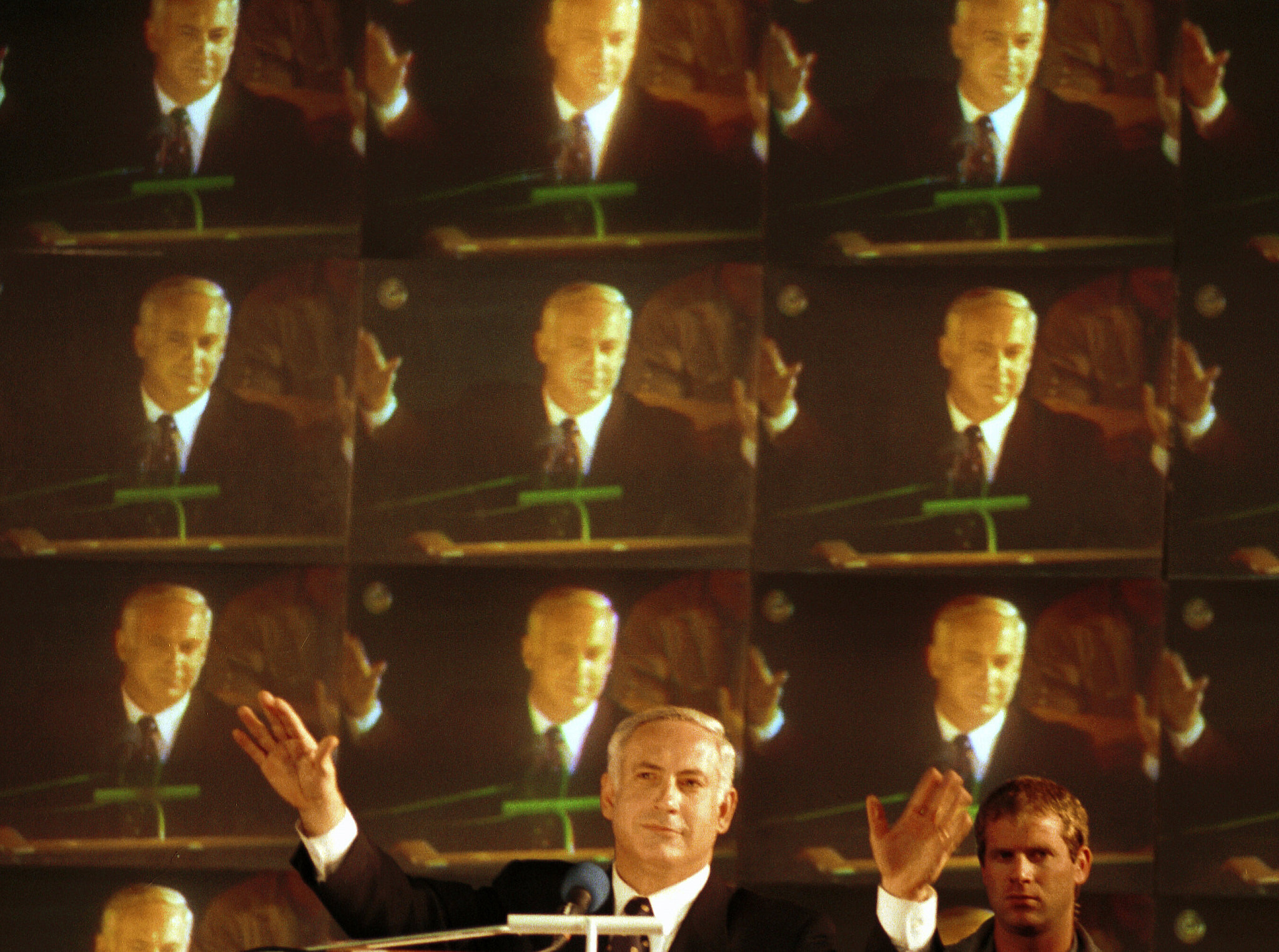 Likud party leader Benjamin Netanyahu raises his hands while giving a victory speech after being elected as prime minister of Israel, June 2, 1996. (Flash90)