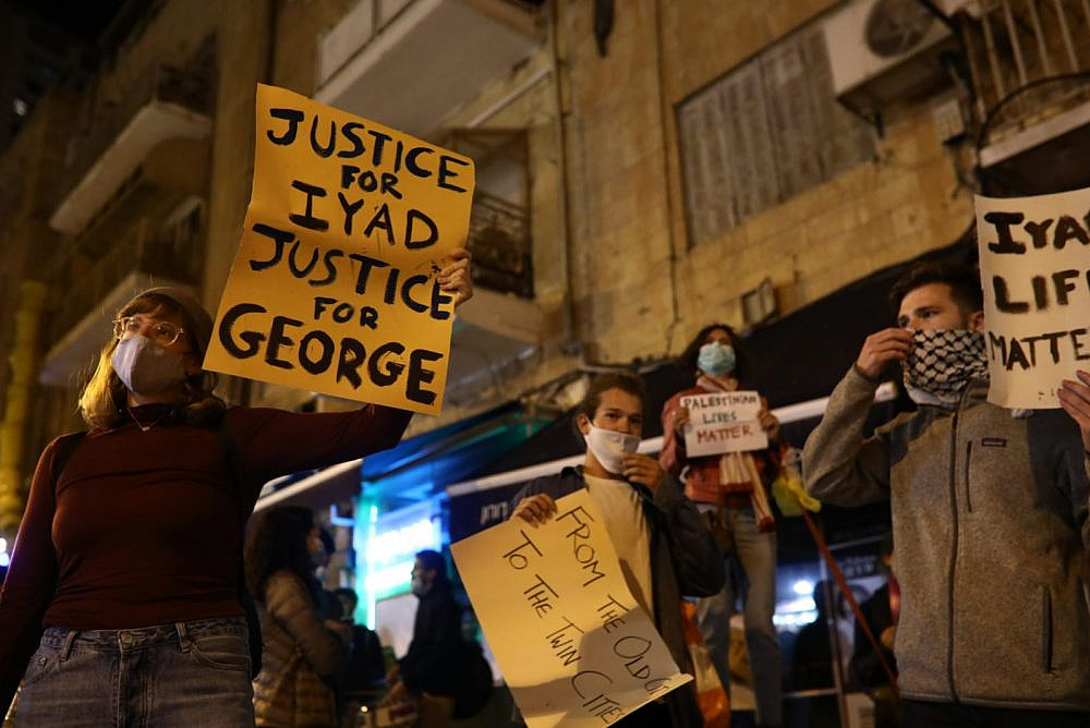 Israelis and Palestinians protest in Jerusalem against the killing of Iyad Halak by Israeli Border Police as well as the killing of George Floyd by Minneapolis police, May 30, 2020. (Oren Ziv)