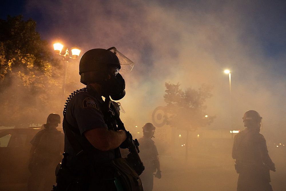 Police officers fire tear gas in St.Paul and Minneapolis during protests following the killing of George Floyd, May 28, 2020. (Hungryogrephotos/Wikimedia)