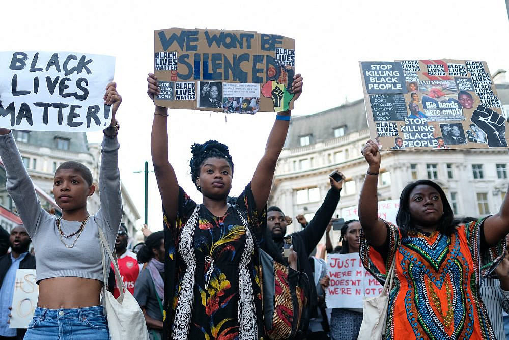 Black Lives Matter protesters in London gather following the police shootings of Philando Castile and Alon Sterling in the United States, July 8, 2016. (Alisdare Hickson/CC BY-NC 2.0)