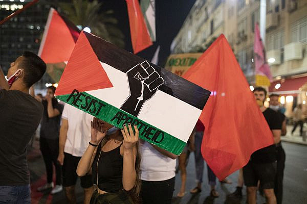 Jewish Israeli and Palestinian protesters take part in a demonstration in Rabin Square against the government's annexation plan, Tel Aviv, June 6, 2020. (Oren Ziv)