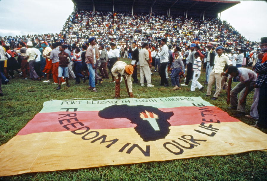Mourners at a funeral ceremony for those killed by South African police on the International Day for the Elimination of Racial Discrimination, at Langa Township in Uitenhage, March 1, 1985. (UN Photo)
