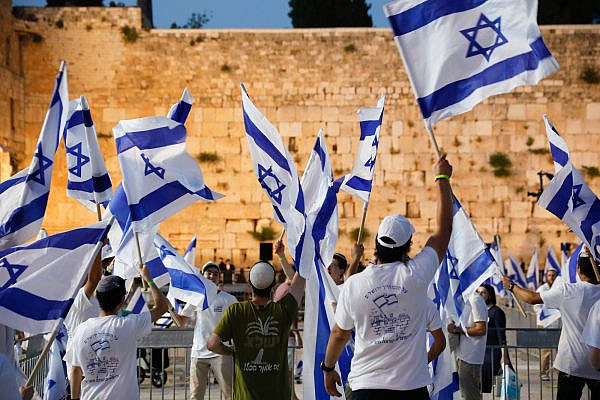 Young Jewish Israelis celebrate Jerusalem Day at the Western Wall in Jerusalem's Old City, May 21, 2020, marking 53 years since Israel occupied East Jerusalem. (Olivier Fitoussi/Flash90)