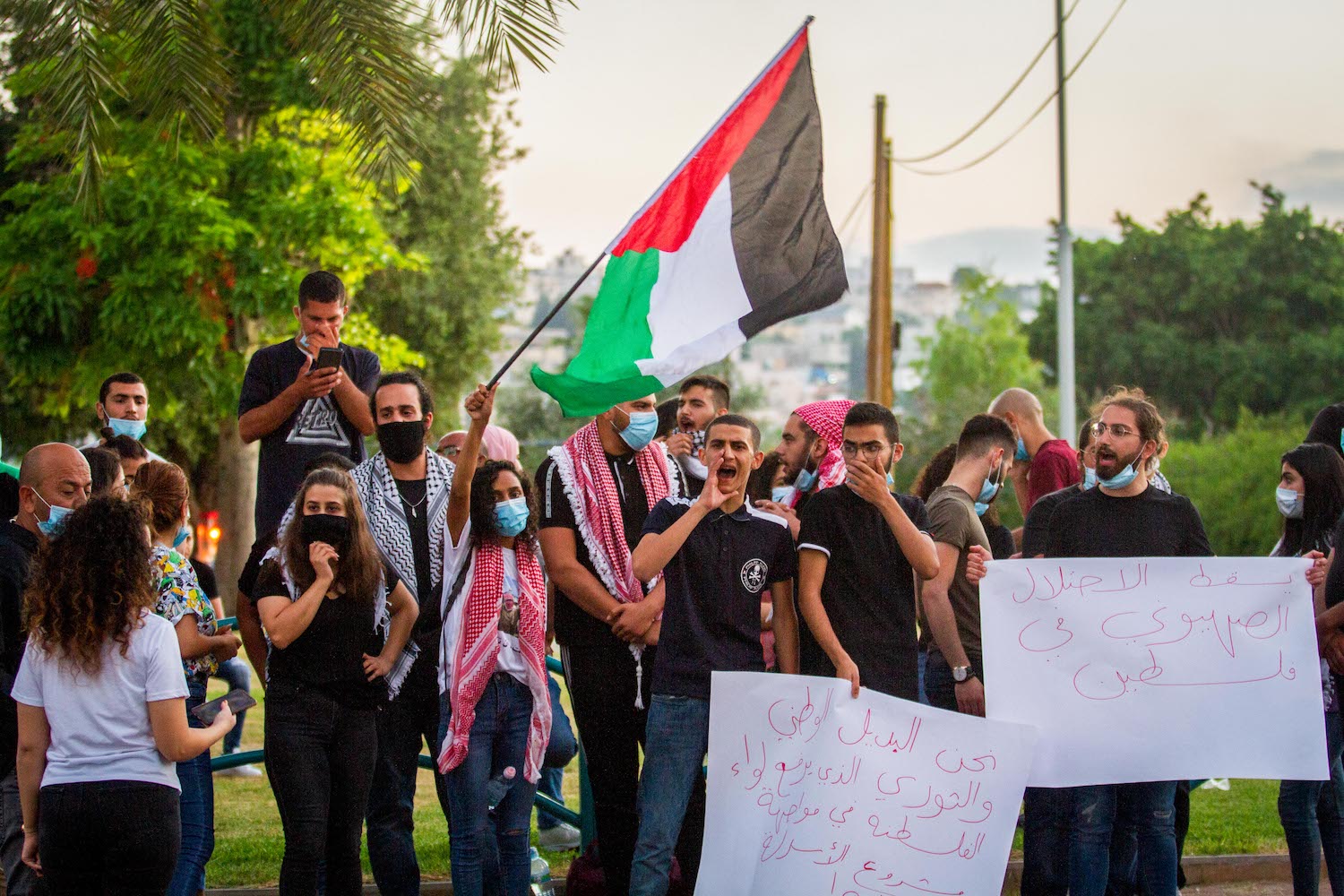 Palestinian citizens protest against Israel's plan to annex parts of the West Bank, near the town of Ar'ara, July 1, 2020. (Flash90)