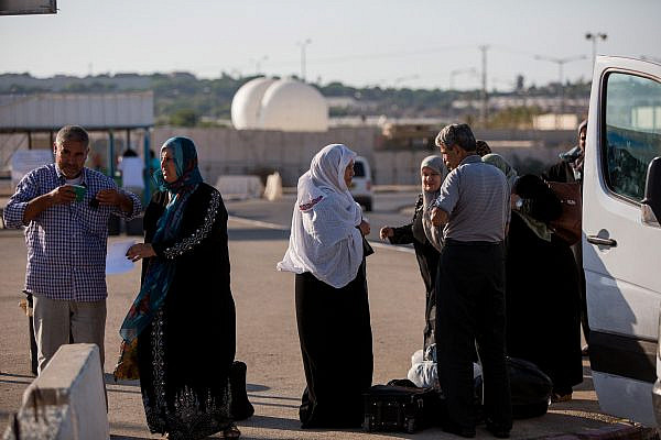Palestinians arrive to cross into Gaza at the Erez Crossing between Israel and Gaza on September 3, 2015. (Yonatan Sindel/Flash90)