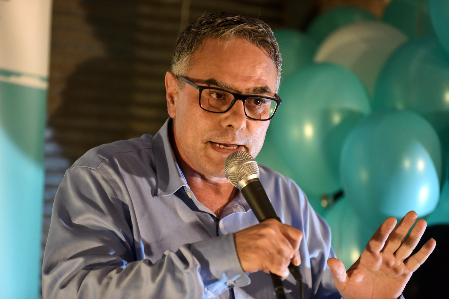 MK Mtanes Shehadeh who heads Balad, one of the parties that make up the Joint List, speaks at an election campaign event in Tel Aviv, August 20, 2019. (Gili Yaari/Flash90)