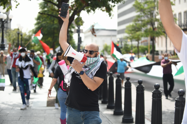 Palestinian activists and allies protest the signing of the Abraham Accords between Israel, the United Arab Emirates, and Bahrain, outside the White House, Washington DC, September 16, 2020. (Gili Getz)