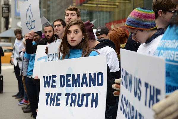 Activists from IfNotNow protest outside Birthright Israel’s offices in New York City, April 5, 2019. (Gili Getz)