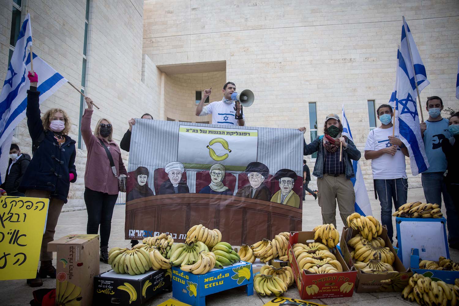 Members of the far-right 'Im Tirzu' movement protest protest outside the Supreme Court in Jerusalem during a hearing on the Jewish Nation-State Law. The activists decried the court as an Islamic "banana republic," December 22, 2020. (Yonatan Sindel/Flash90)