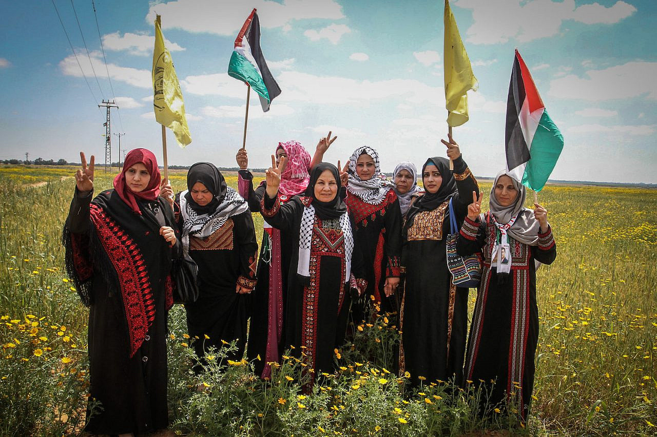 Palestinians take part in a demonstration on the anniversary of Land Day, near Khan Younis in the southern Gaza Strip, on March 30, 2016. (Abed Rahim Khatib/ Flash90)