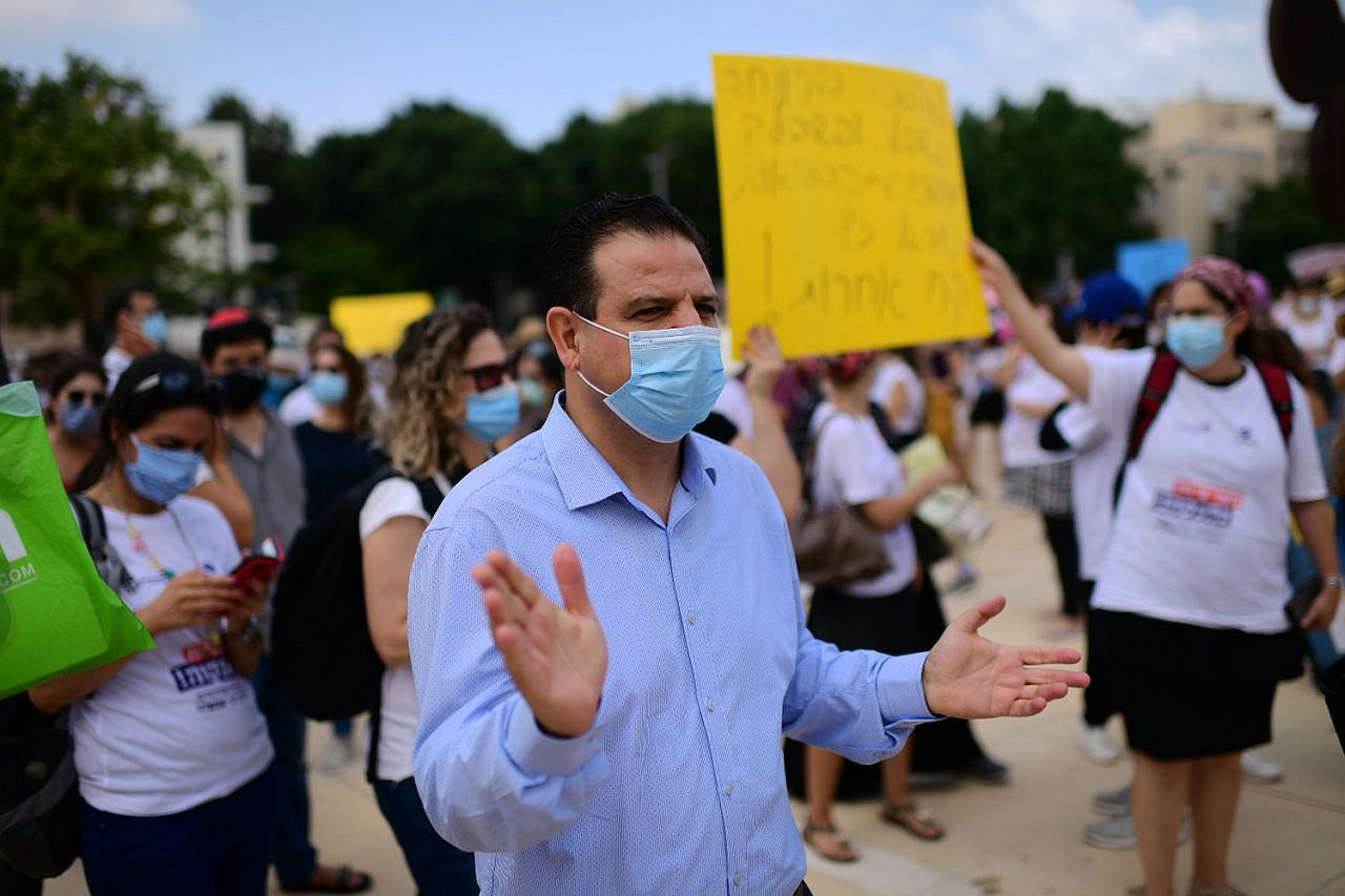 Leader of the Joint list Ayman Odeh seen during a protest organized by Israeli social workers at Habima Square in Tel Aviv on July 6, 2020. (Tomer Neuberg/Flash90)