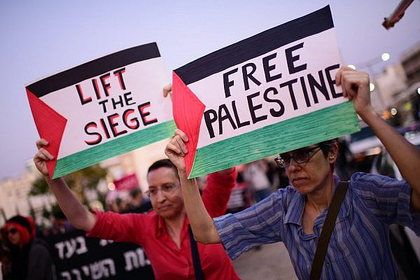 Activists protest against apartheid and call to boycott the Eurovision, in Tel Aviv on May 14, 2019. (Tomer Neuberg/Flash90)