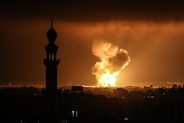 Smoke and flames rise after the Israeli military conducts an airstrike west of Khan Yunis, Gaza Strip, May 11, 2021. (Abed Rahim Khatib/Flash90)