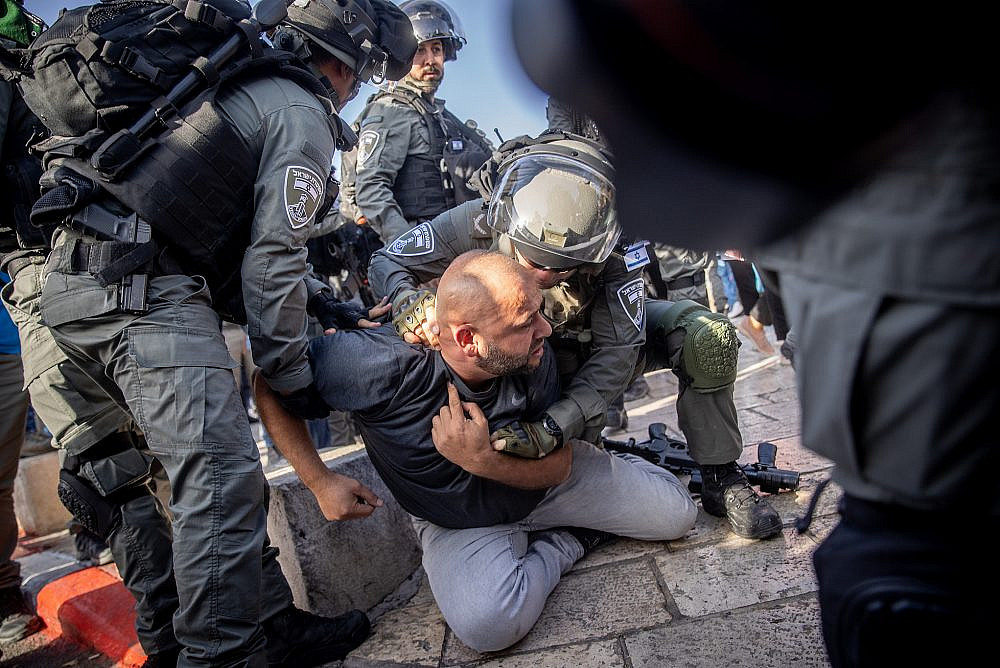 Israeli police officers during clashes with protesters following a visit of right-wing politician Itamar Ben Gvir at Damascus Gate in Jerusalem Old City, June 10, 2021. (Yonatan Sindel/Flash90)